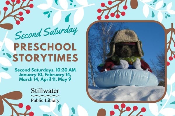 Puppet Baby Bear in a snow tube on snow