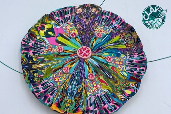 colorful dish made of clay with a butterfly design